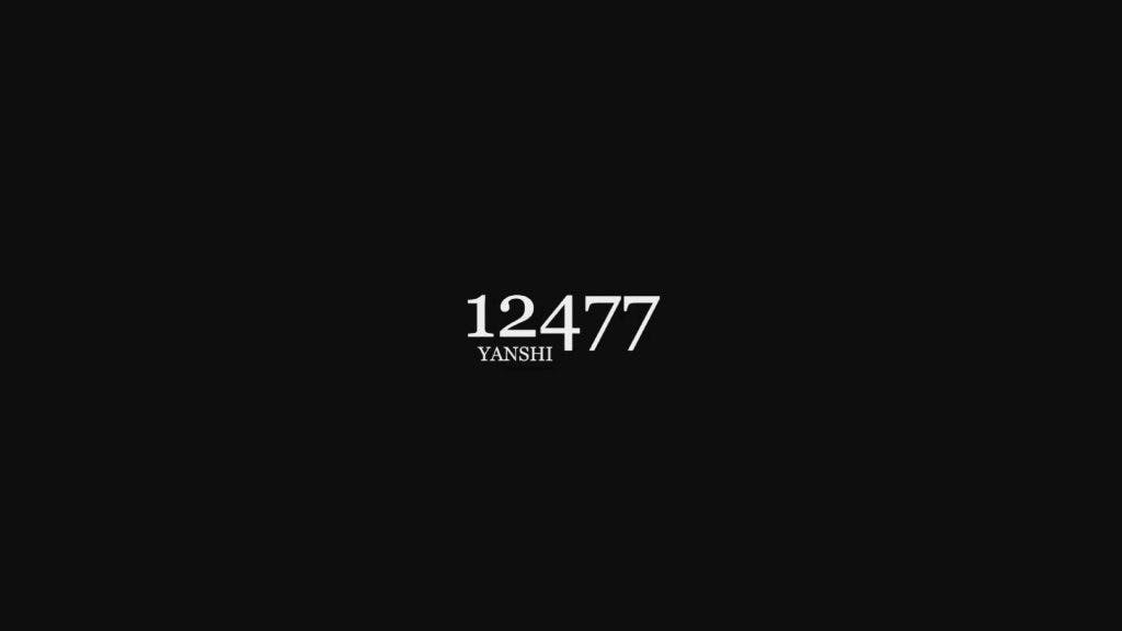 12477